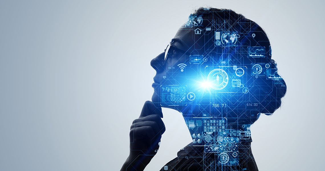 Woman looking up with images overlaid on her silhouette